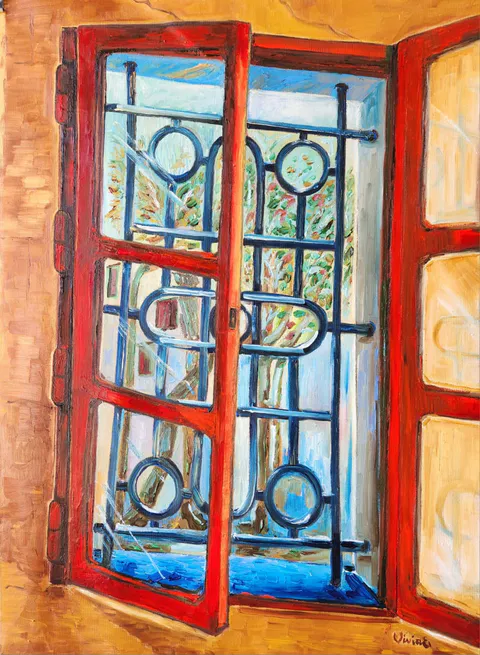 An open red window against ochre walls, with blue circular and oval ironwork, pale foliage beyond, and a bright blue sill